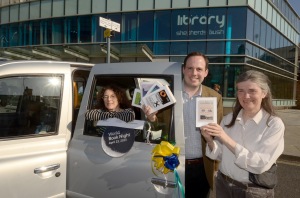World Book Night 2013, book givers with taxi outside Shepherds Bush Library